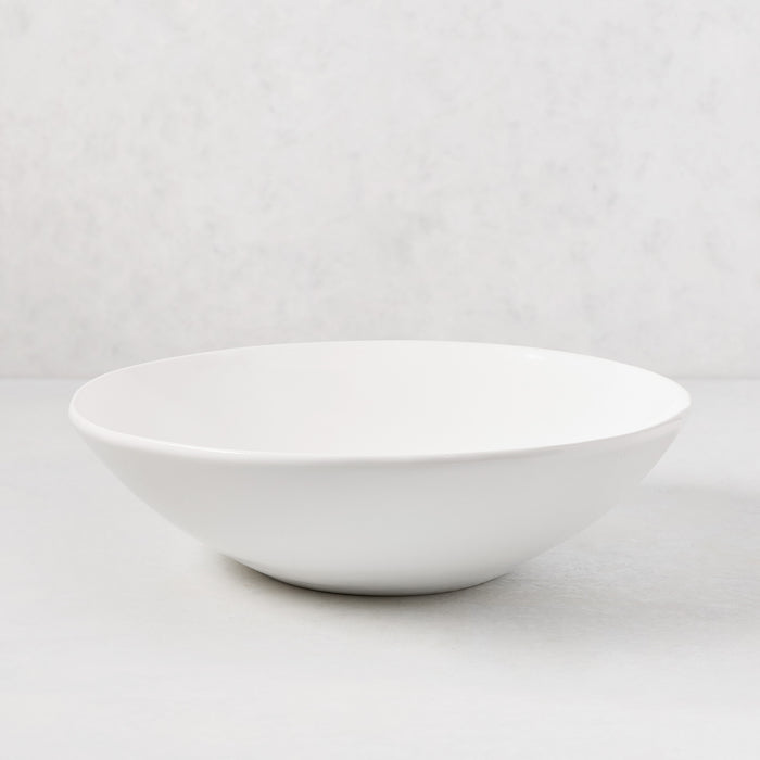 Organic Flared Ceramic Serve Bowl, creamy white, 12" diameter, subtle organic edges.