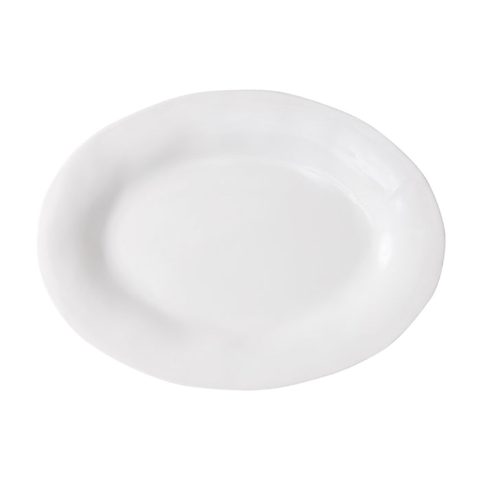 Organic Oval Ceramic Serving Platter, creamy white glaze, subtle organic edges, 13" W x 18" L.