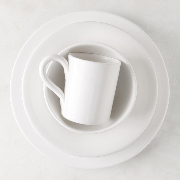 HG Original 10" creamy white ceramic bowl with a smaller bowl and mug stacked inside.