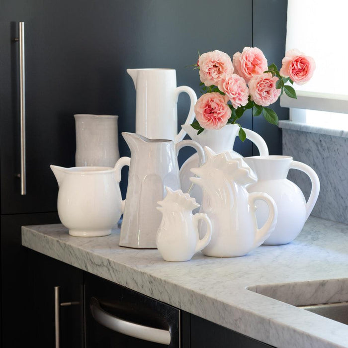 HG Original Large Round Ceramic Pitcher in creamy white, 9"W x 10"H, on a marble counter.