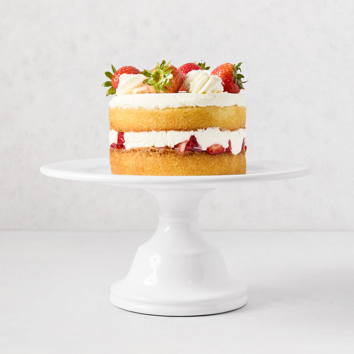 HG Original Small Pedestal Cake Stand, creamy white ceramic, 10.5" Dia, with strawberry cake.