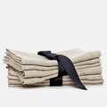 Oversized natural washed flax linen napkins, set of 4, tied with a black ribbon.