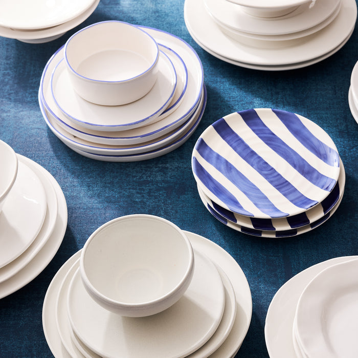 Pacific Blue-Rimmed Stoneware Salad Plate with irregular shape, 8" diameter, and blue striped plates.
