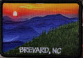 A patch with a photo-over mountain sunset scene, with the text 'BREVARD, NC' at the bottom.