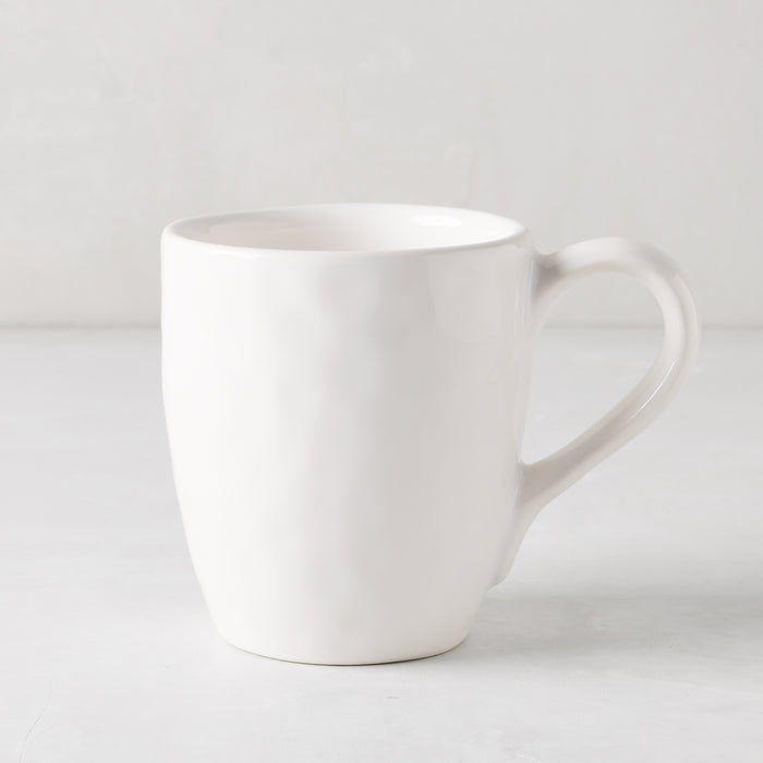 Pebble White ceramic mug with a creamy glaze and subtle textures, 10.14oz.