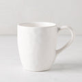Pebble White ceramic mug with a creamy glaze and subtle textures, 10.14oz.