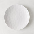 Pebble White ceramic salad plate, 8.5" diameter, with subtle textures and creamy white glaze.