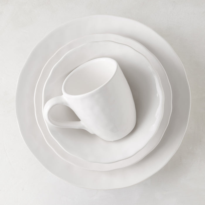 Pebble White ceramic soup bowl, plate, and mug set with subtle textures and creamy glaze.