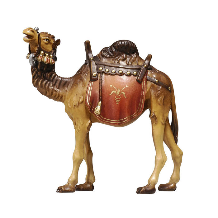 Hand-carved PEMA Kostner nativity camel made from sycamore maple wood, oil-painted with ornate saddle and red cloth, crafted in Val Gardena, Italy.