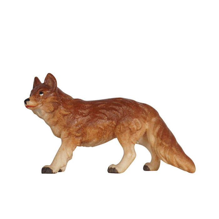 Hand-carved PEMA Kostner nativity fox standing and looking slightly left, with realistic red-brown coloring and a bushy tail, crafted in Val Gardena, Italy.