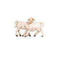 Hand-carved PEMA Kostner nativity group of two white lambs playing together, made from sycamore maple and oil-painted, crafted in Val Gardena, Italy.
