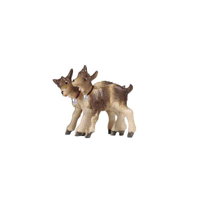 Hand-carved PEMA Kostner nativity pair of young goats standing closely together with heads inclined toward each other and wearing small bell collars, crafted in Val Gardena, Italy.