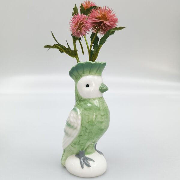 Green ceramic parrot vase