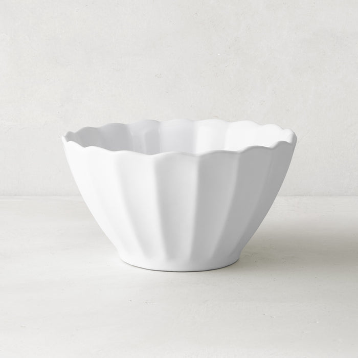 White Petal Stoneware Bowl, 6" diameter, with a fluted, vintage-inspired design and rounded edges.