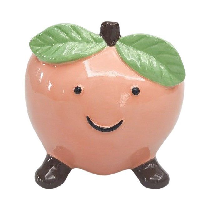 Ceramic peach-shaped with a smiling face vessel