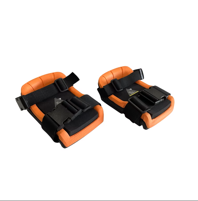 Pitch Hopper Knee Pads by FENTO, inner side showing orange EVA foam and quick-release buckle
