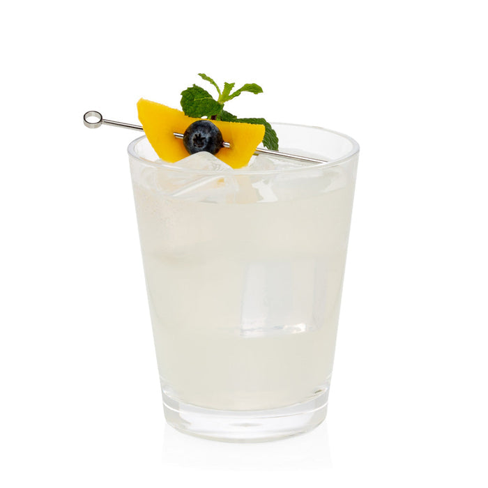 Clear acrylic double old-fashioned glass with a cocktail, garnished with mango, blueberry, and mint.