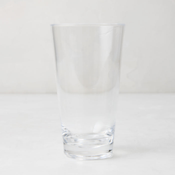 Clear acrylic high ball glass, 19oz, with a sturdy bottom and smooth lip.