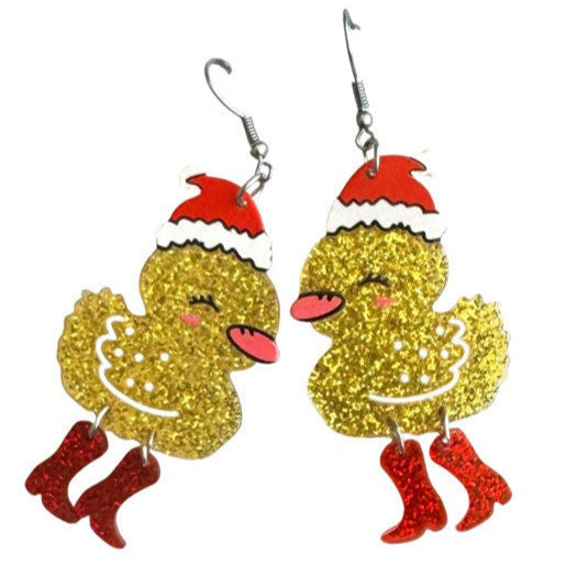 Christmas-themed duck earrings with glittery gold bodies, red boots, and Santa hats