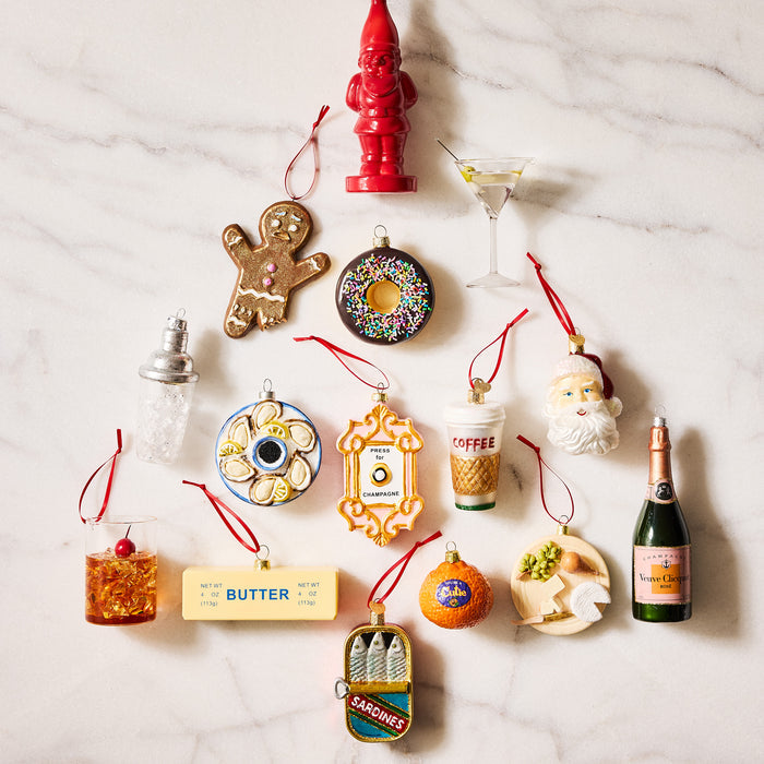 Press for Champagne glass ornament with gold frame and button detail, 2.75 inches tall.