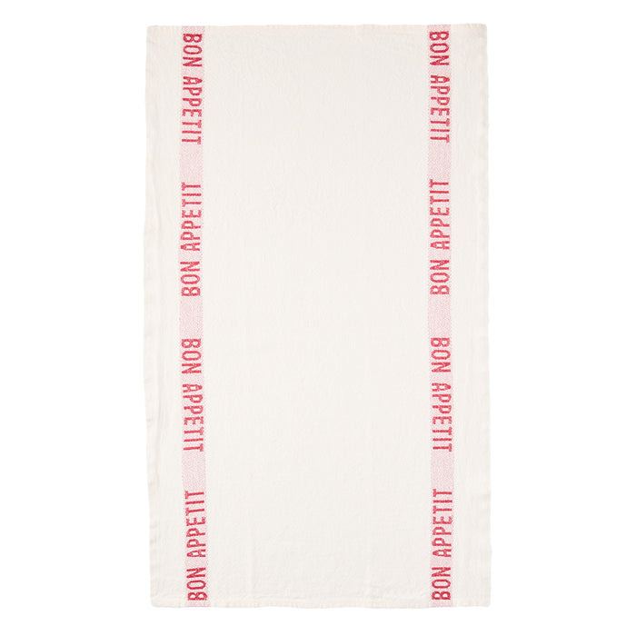 White linen hand towel with vertical red "Bon Appetit" text stripes.