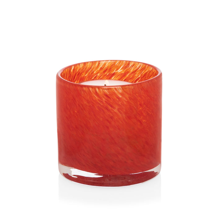 Mouth-blown, hand-formed red glass votive candle holder with a subtle swirled texture.