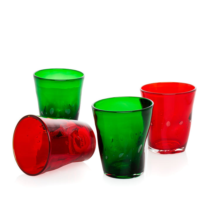 Four handmade Henri glasses: two vibrant red, two emerald green, with unique air bubbles.