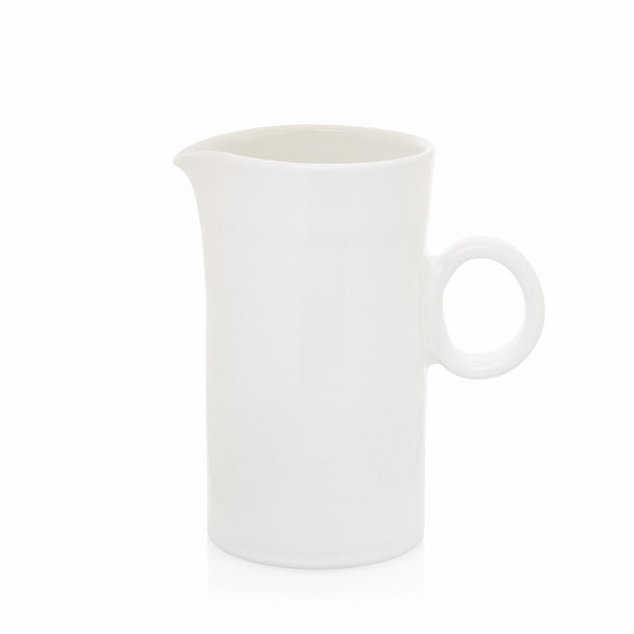Creamy white ceramic pitcher with a simple ring handle and spout, 8"H.