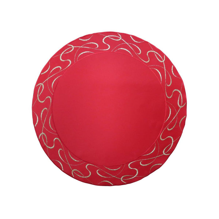 Round red table linen with decorative embroidered scroll border