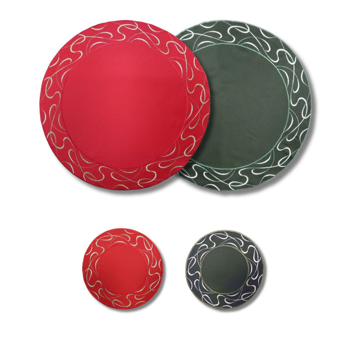 Set of round table linens in red and green with embroidered scroll border, available in large and small sizes