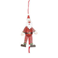 Decorative Christmas ornament of a Santa Claus figure with red hat and pants