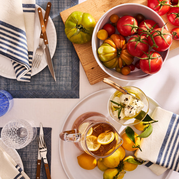 Clear glass breakfast bowl with a unique scissor-cut top.