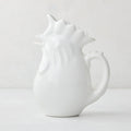 White ceramic rooster pitcher, 6.75"H, with a glossy glaze and detailed comb.