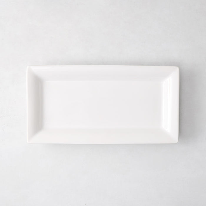 Small Lucca rectangular serving platter, white ceramic, 17"L x 9"W, modern sleek design.
