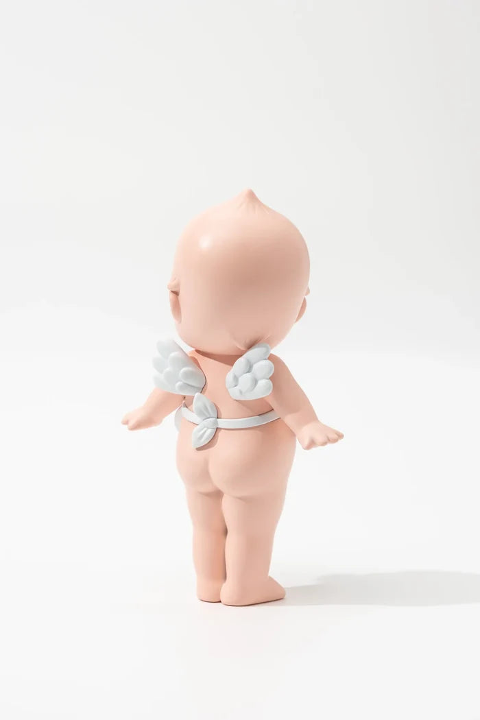 Smoko Kewpie®️ Blind Box Figure featuring a peachy cherub with white wings and sash, highlighting its collectible nature for art toy enthusiasts.