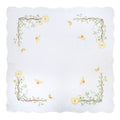 White square linen tablecloth with scalloped edges, floral vine embroidery, yellow flowers, and butterfly accents
