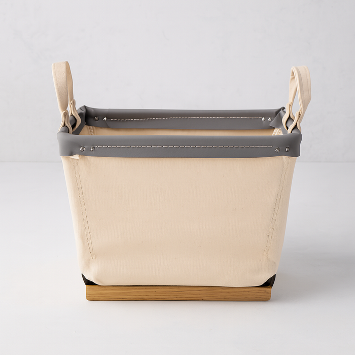Steele 1-Bushel Canvas Carry Basket with natural canvas, gray trim, and wood runners.