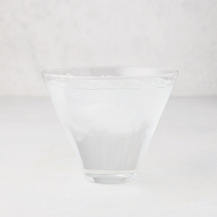 Hudson Grace Stemless Martini Glass, clear glass, 8 oz, filled with clear liquid and ice.