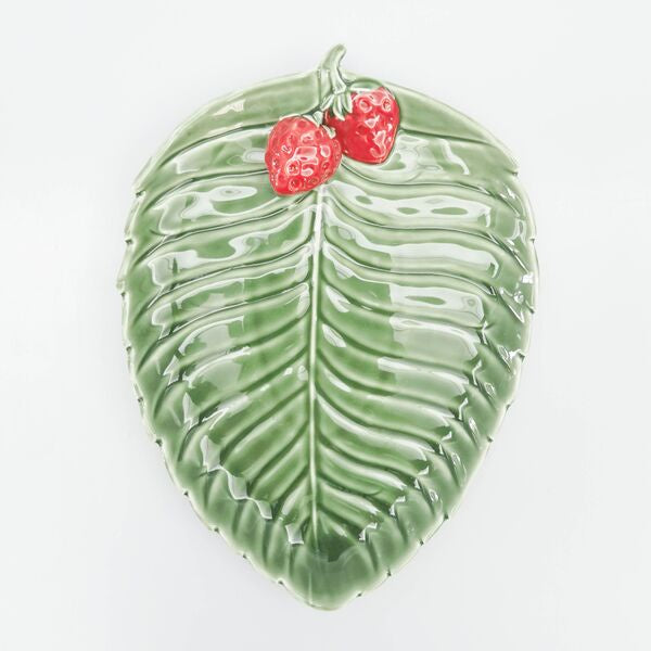 Green leaf-shaped plate with red berries