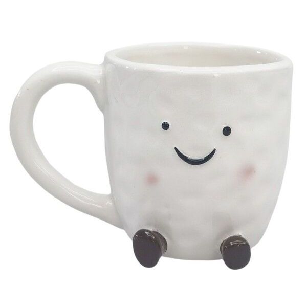 White ceramic mug with a smiley face design