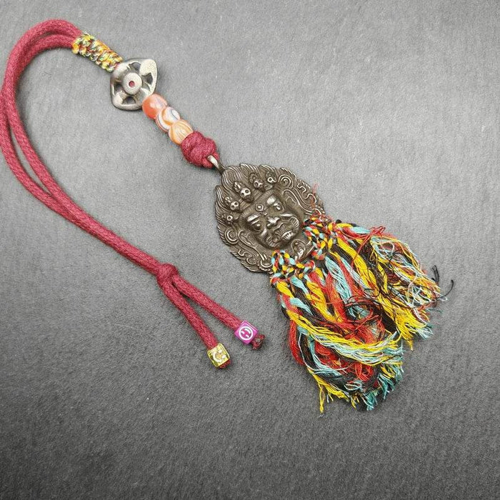 Thokcha Amulet,Mahakala Pendant, Buddhist Protector - Tibetan Buddhist amulet, close-up detail