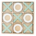 Tic-tac-toe game board with green and white pieces