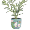 decorative pot with a hummingbird design