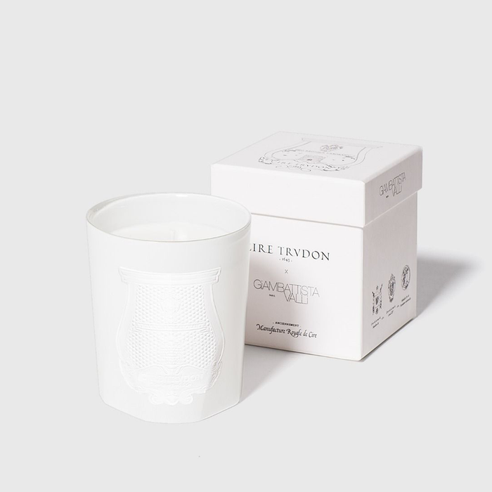 White Trudon Positano scented candle in a handmade glass vessel with matching white box.