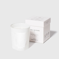 White Trudon Positano scented candle in a handmade glass vessel with matching white box.