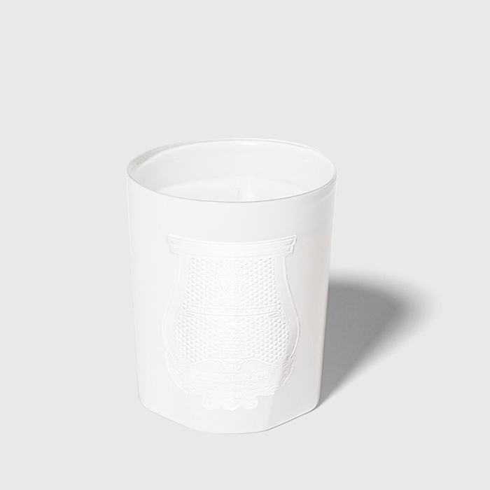White Trudon Positano scented candle in a handmade glass vessel with embossed Giambattista Valli crest.