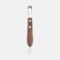 Walnut wood channel knife with stainless steel blade and two silver rivets.