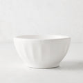 White ceramic latte bowl, 5.5" diameter, with subtle fluted sides.