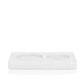 White marble dish soap and lotion tray with two circular indentations.