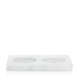 White marble hand soap and lotion tray with two honed circular indentations.